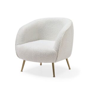 Butaca en tela con las patas doradas.